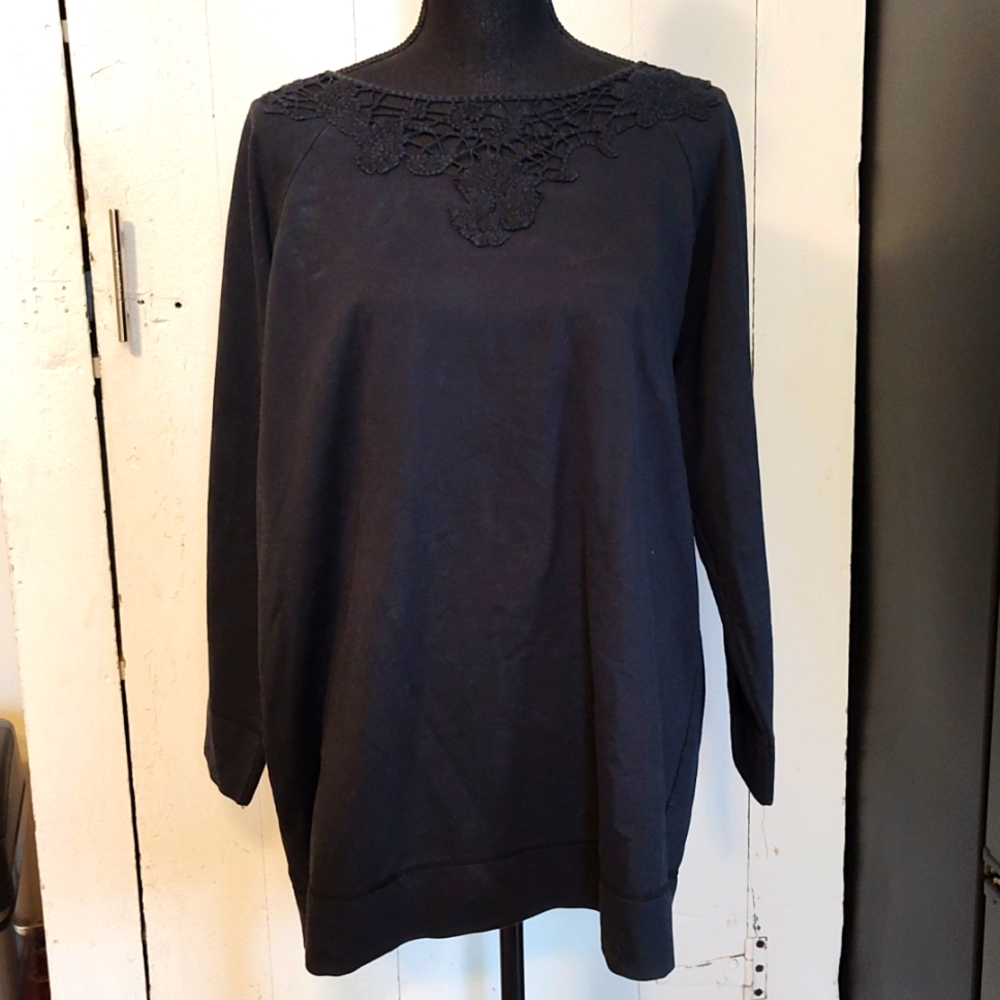 Woman within sweatshirt